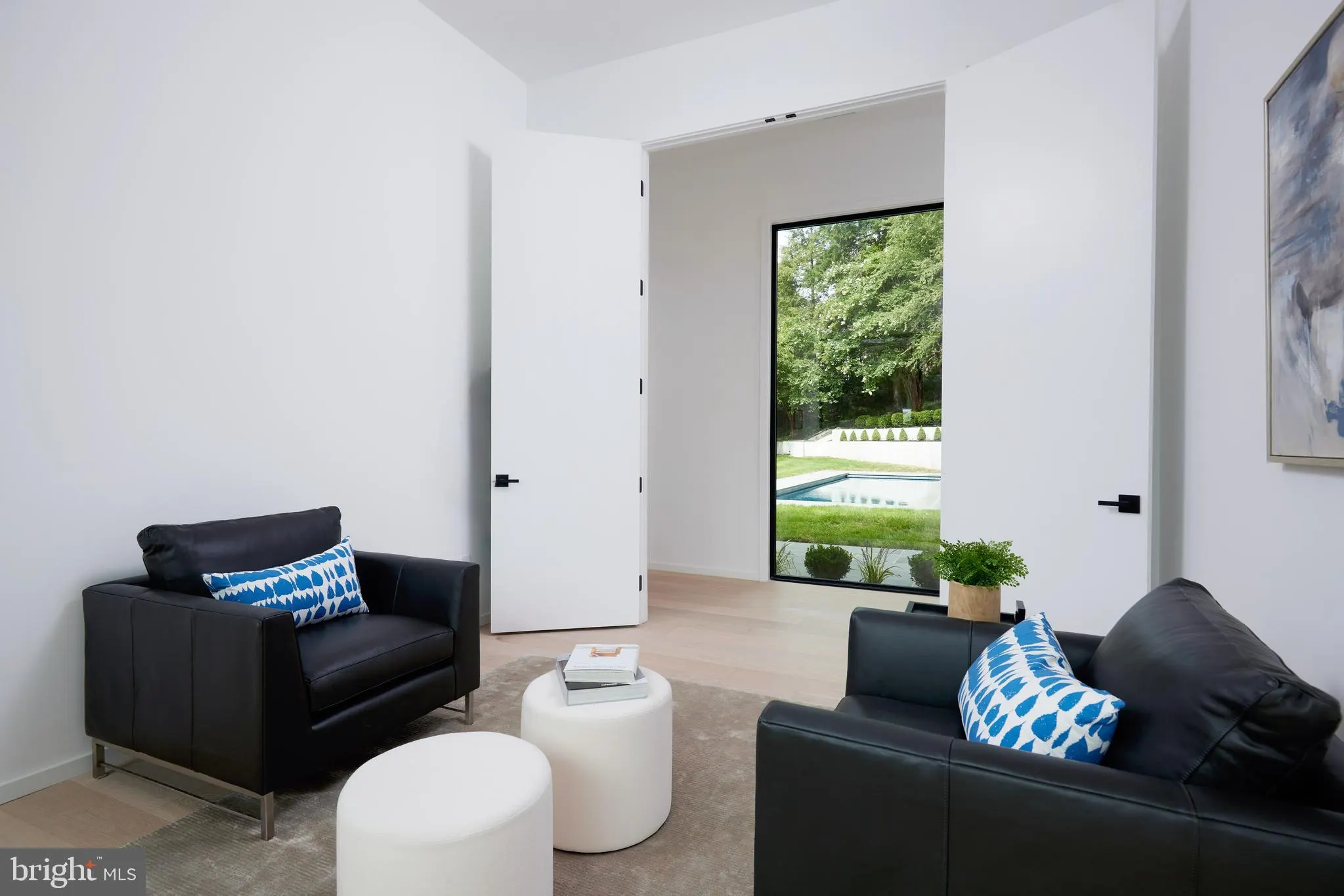 Mudroom with built-in cubbies and a patterned tile floor