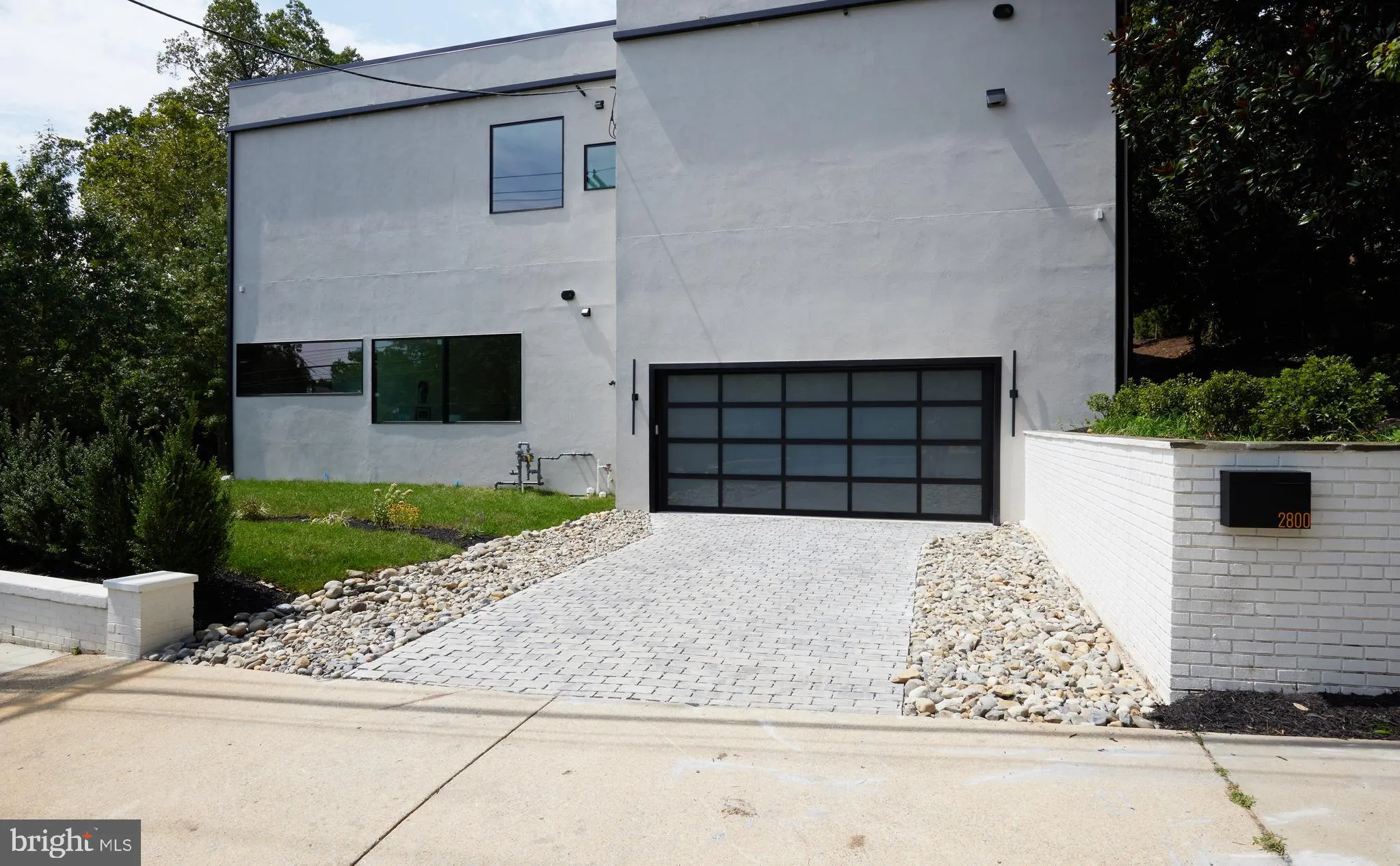 Climate-controlled garage with a glass door