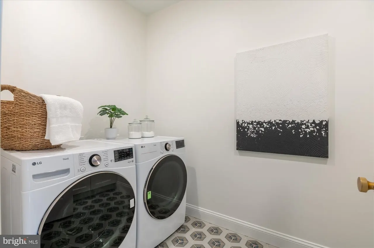 Laundry room with front-load washer and dryer