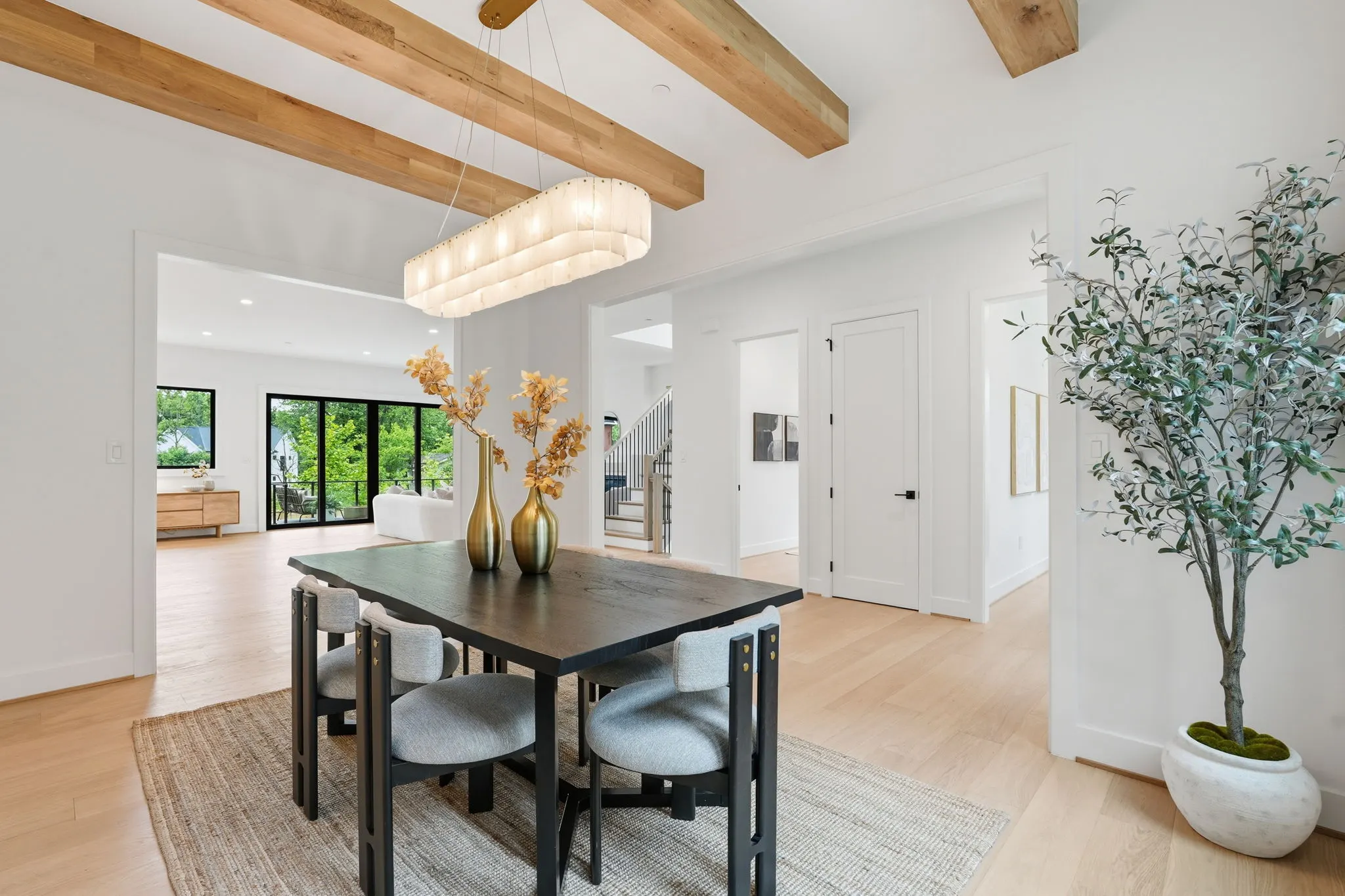 Dining room under exposed white oak beams