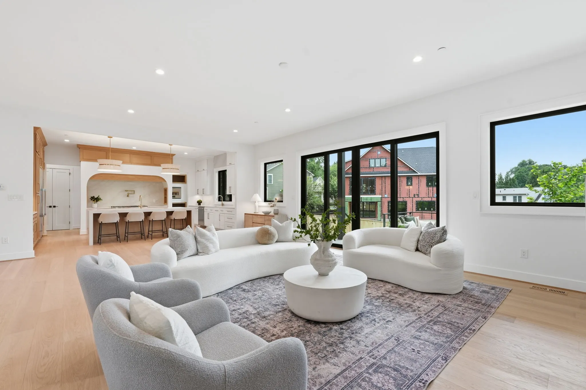Open living and kitchen space at 4308 Dresden St, a Colonial spec home