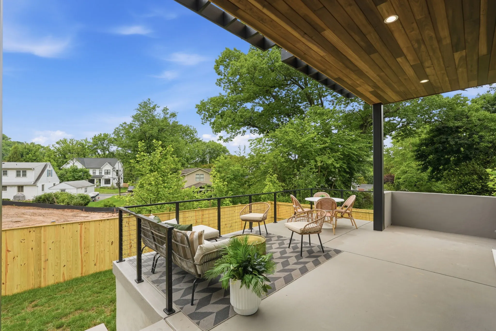 Rear yard of 4308 Dresden St from the second-floor balcony