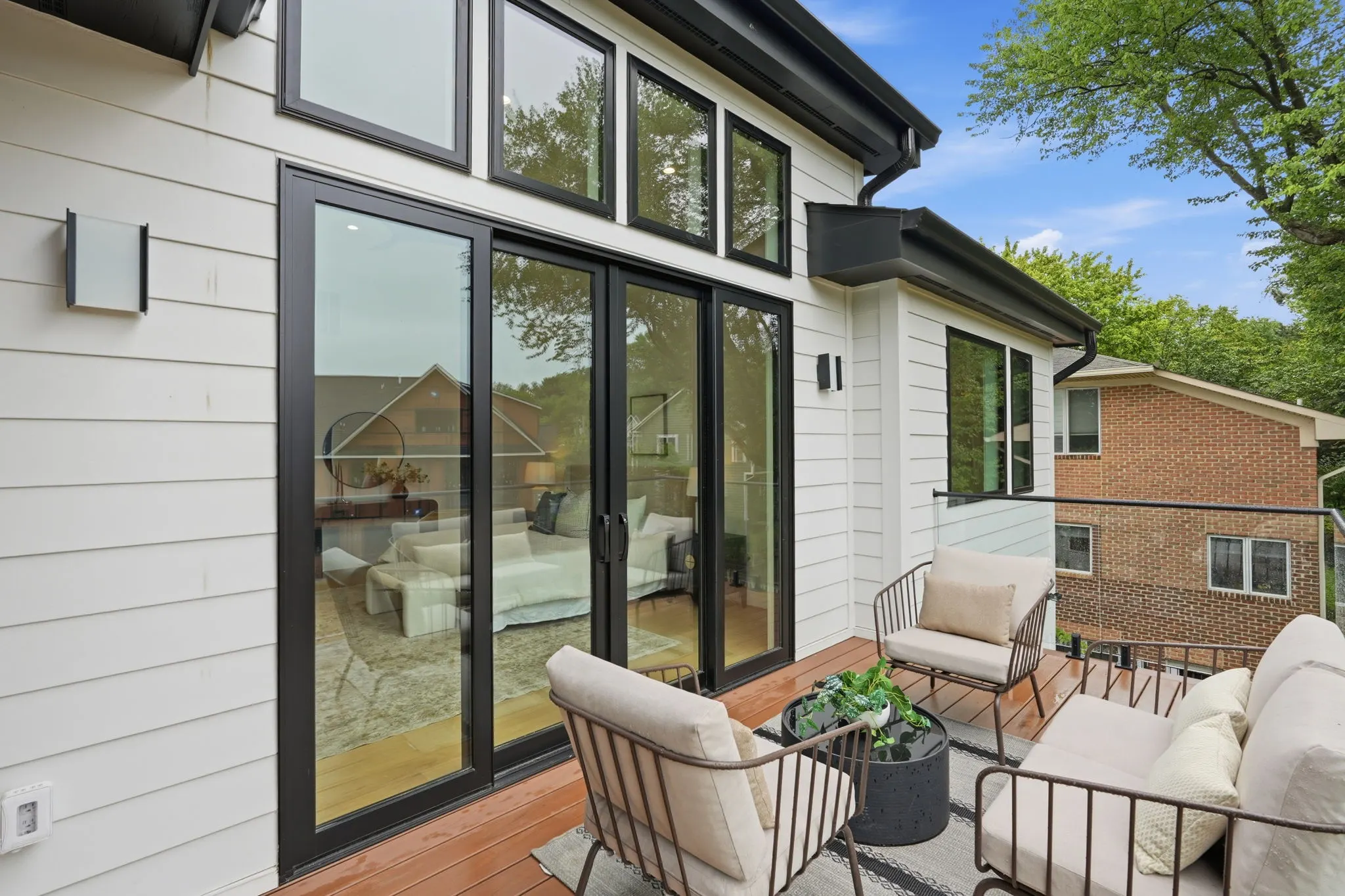 Wooden deck with glass doors at 4308 Dresden St, built by Colonial