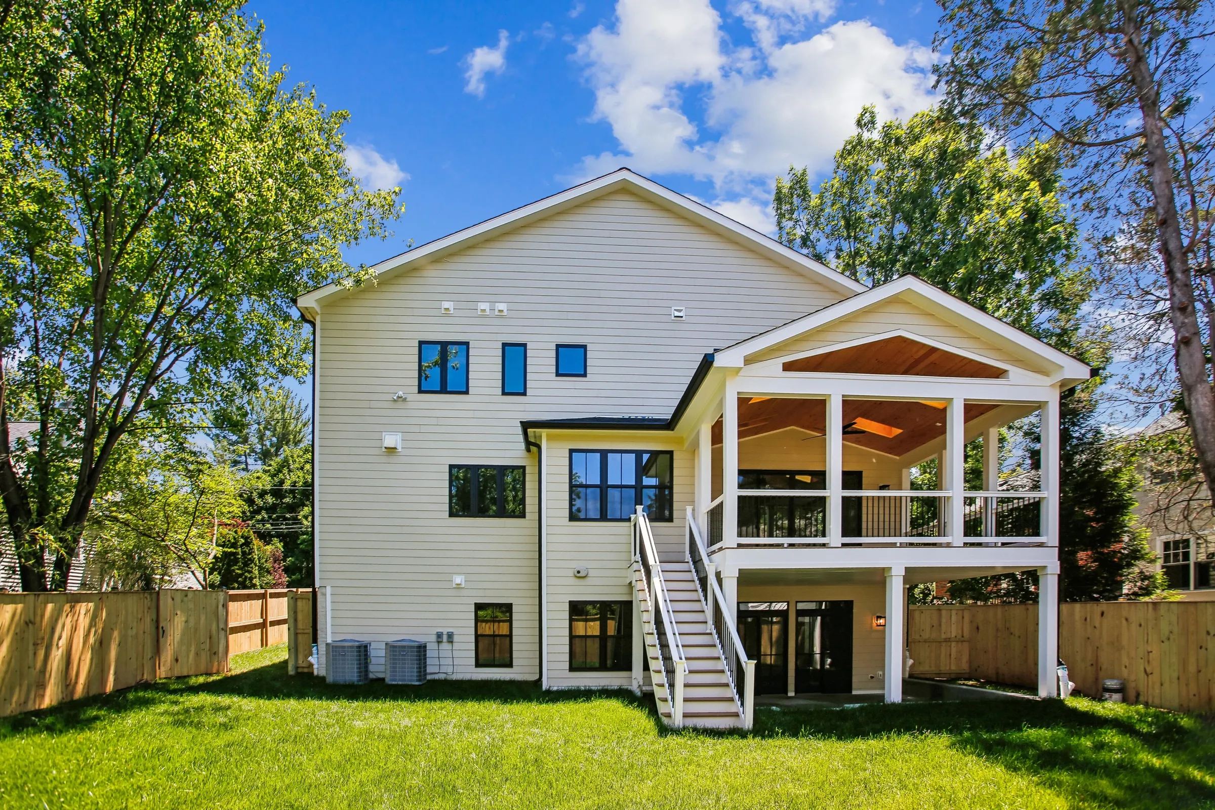 Back elevation and new lawn of a Colonial build at 6003 Melvern Dr, Bethesda