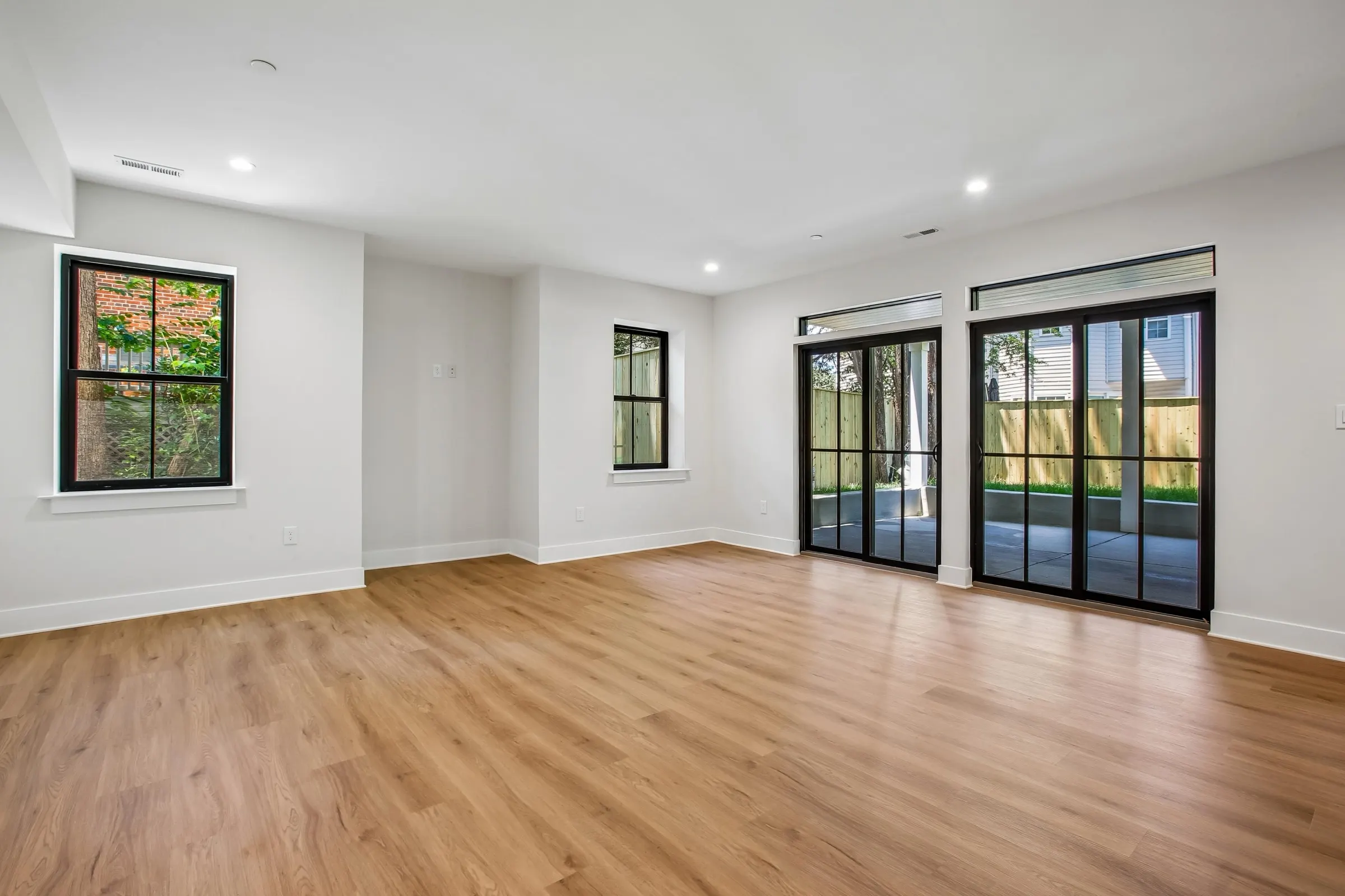 Finished walkout lower level with sliding glass doors to a patio