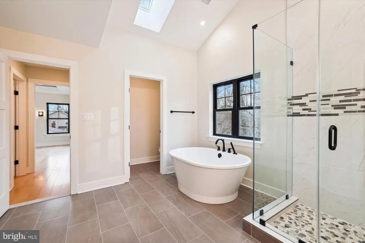 Primary bathroom with soaking tub and walk-in shower