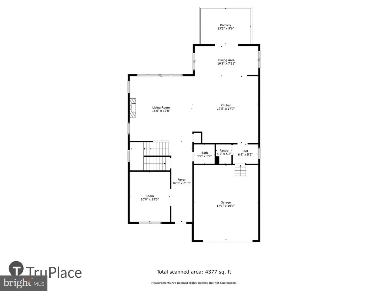 Floor plan showing kitchen, living room, bedrooms, and garage layout